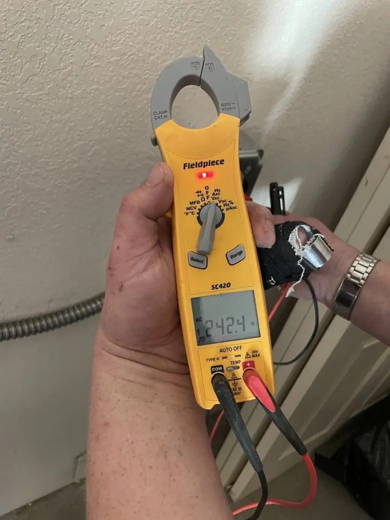 Voltage testing with clamp meter during Circuit Breaker Repair in Eglin AFB